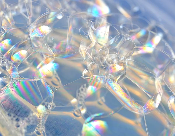 Tvål bubblor på blå bakgrund — Stockfoto