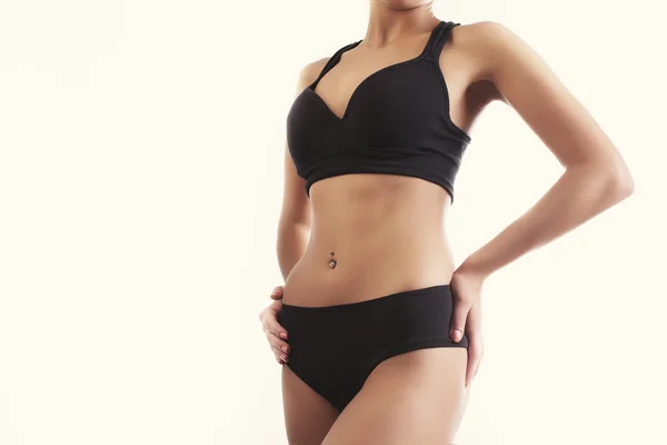 Close-up beeld van fitness vrouwelijke model in sportkleding — Stockfoto