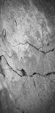 Aged grunge abstract concrete texture with dents and cracked wal clipart