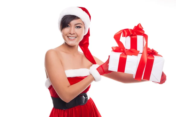 Santa hat Christmas woman holding christmas gifts smiling happy — Stock Photo, Image