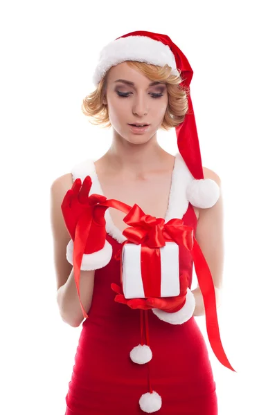 Christmas Woman with Gift Box. Beautiful Blonde Girl in Santa Ha Stock Image