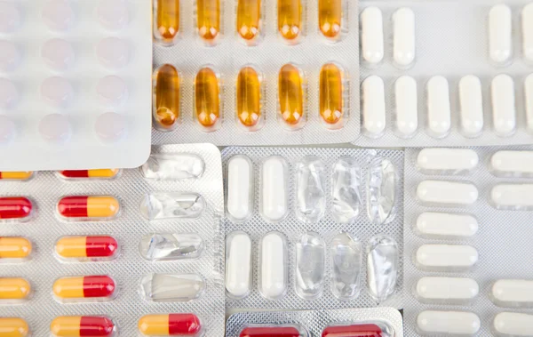Píldoras de la medicina vista superior fondo foto —  Fotos de Stock