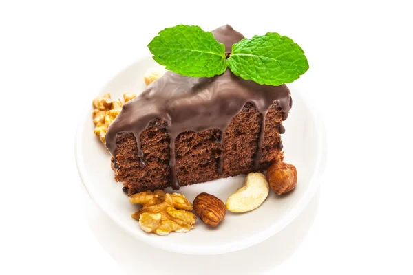 Photo of piece of chocolate cake over white isolated background — Stock Photo, Image
