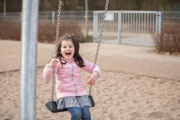 Little Girl Playing Playground Stock Image