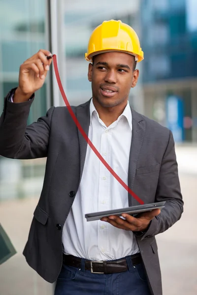 Construction engineer drawing with a digital pen — Stock Photo, Image