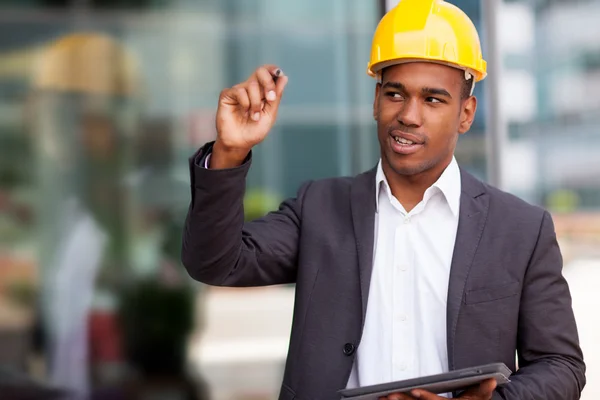 Construction engineer drawing with a digital pen — Stock Photo, Image
