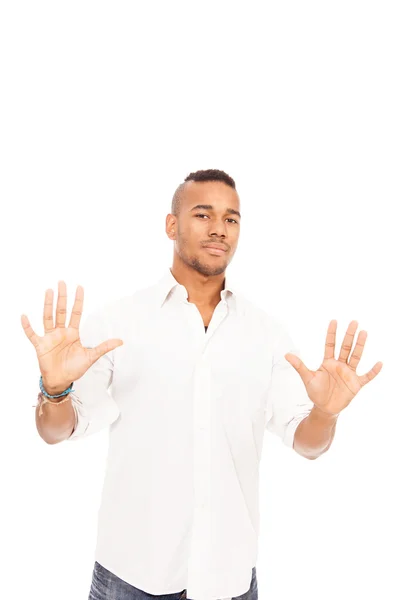 African man denies over white isolated background — Stock Photo, Image