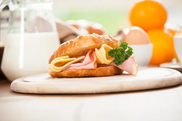 Delicious ham and cheese croissant — Stock Photo, Image