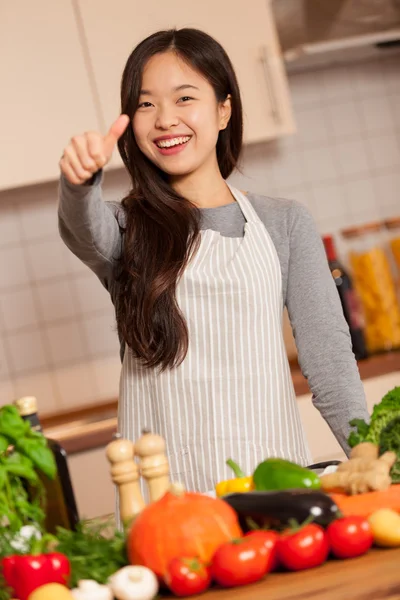 Asiatico donna sta facendo positivo pollice gesto — Foto Stock