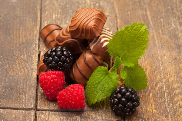 Chocolate pralines with red fruits — Stock Fotó