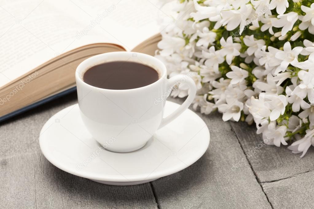 Cup of coffee while reading a book