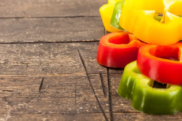 Sliced colorful peppers — Stock Photo, Image