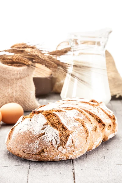 Wheat bread and ingredients — Stock Photo, Image