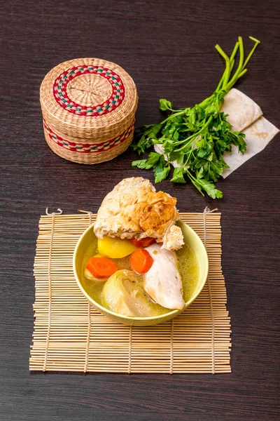 Tatar national Lagman soup with meat and vegetables and a piece — Stock Image Tatar national Lagman soup with meat and vegetables and a piece Stock Picture