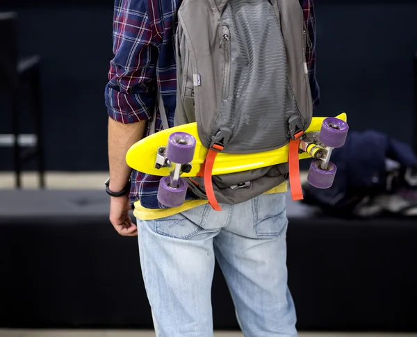 Skate on backpack, rear view — Stock Photo, Image