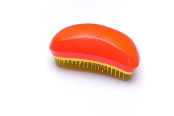 Escova de cabelo colorido isolado no fundo branco — Fotografia de Stock
