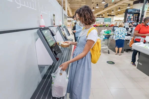 February 2021 Dubai Uae Woman Wearing Face Mask Scans Her — Foto de Stock