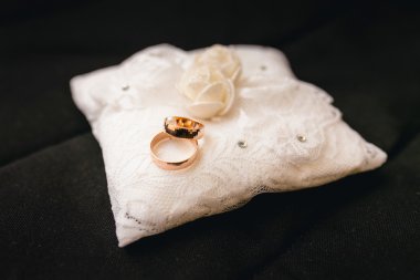 wedding rings pillow on black clipart