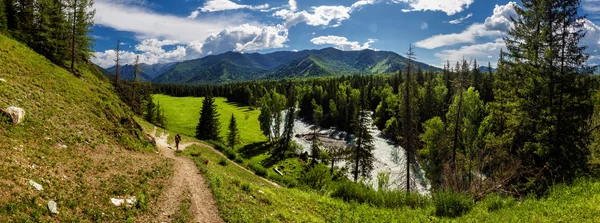 One hiker on trek in mountains — Stock Photo, Image