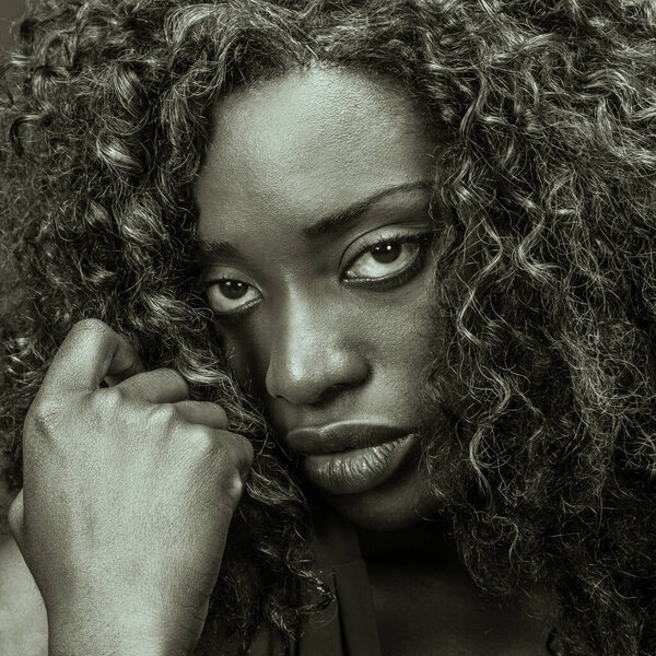 Closeup portrait of an unhappy black woman