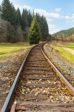 Railway tracks near National Nature Reserve Adrspach-Teplice Rocks. Bohemia region, Czech Republic