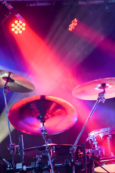 drum kit under spotlights