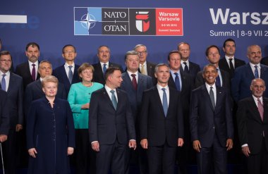 Group photo of participants of NATO summit in Warsaw clipart