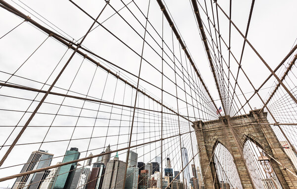 NEW YORK, USA - Apr 29, 2016: Brooklyn Bridge in New York. Manhattan skyline in background