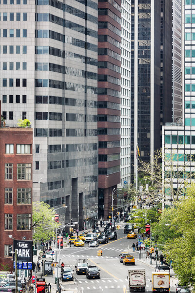 NEW YORK, USA - Apr 29, 2016: Streets of Manhattan, New York City. Manhattan is the most densely populated of the five boroughs of New York City