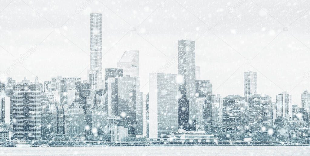 Winter in New York City. Falling snow in NYC. Winter Manhattan in the snowfall