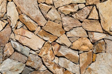 Grunge tuğlası duvar. Arka plan için eski kaya duvar dokusu. Arkaplan ya da doku olarak taş duvar.