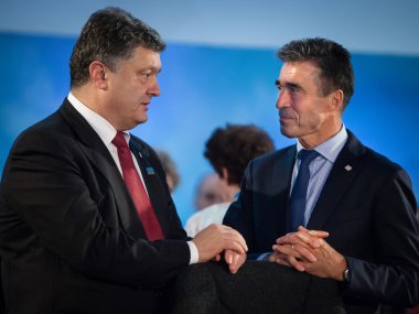 Petro Poroshenko and Anders Fogh Rasmussen during a meeting at t clipart