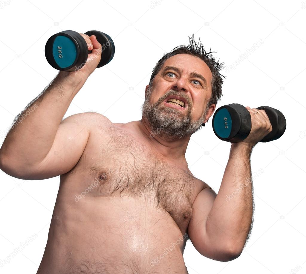  man exercising with dumbbells