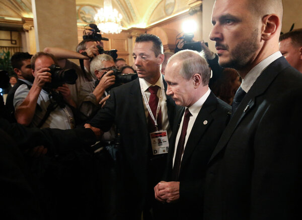 Vladimir Putin during a meeting on the ASEM summit