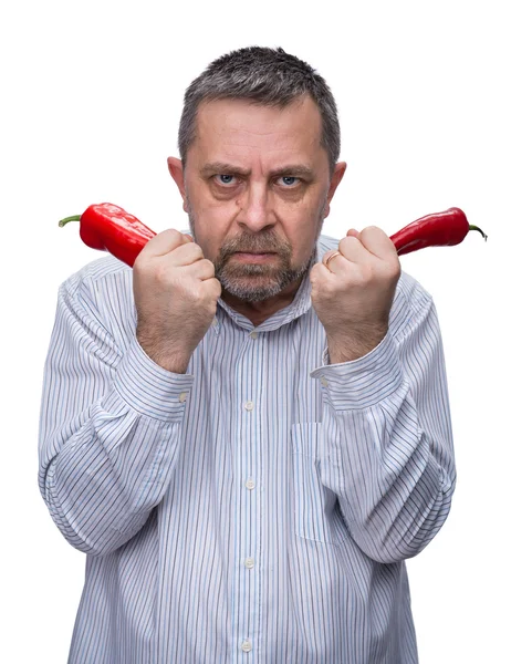 Ένας άνθρωπος με μια κόκκινη πιπεριά — Φωτογραφία Αρχείου