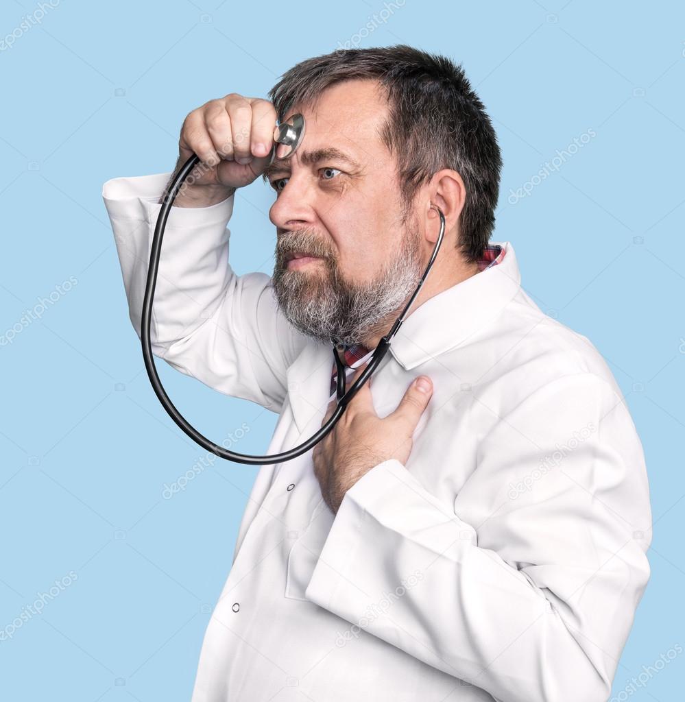 Mad doctor with a stethoscope