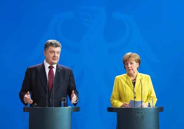 Angela Merkel en Petro Poroshenko — Stockfoto