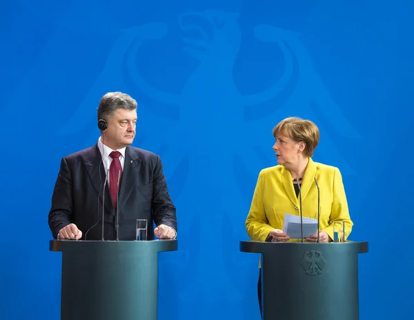 Angela Merkel en Petro Poroshenko — Stockfoto