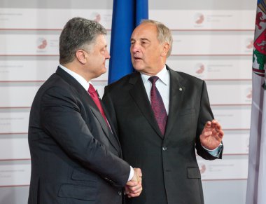 Andris Berzins ve Petro Poroshenko