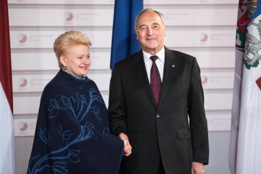Andris Berzins ve Dalia Grybauskaite