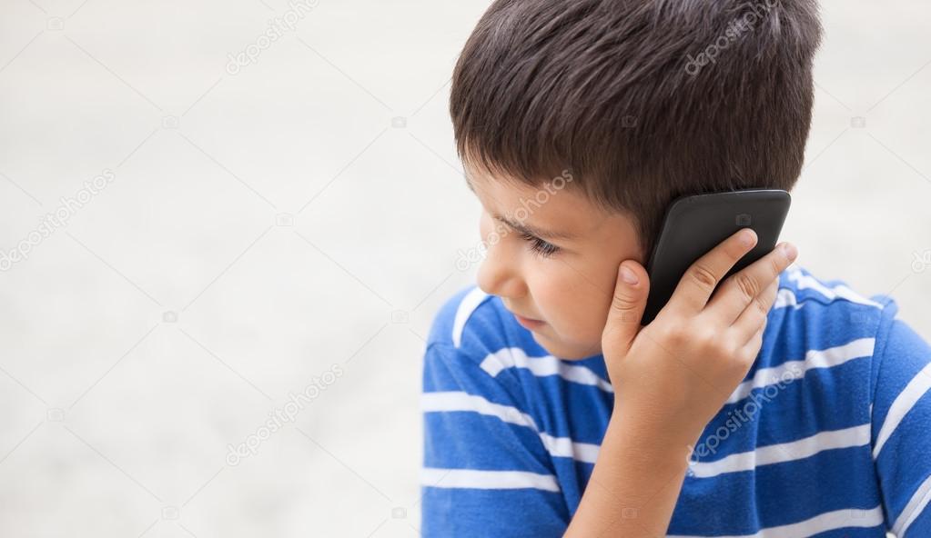 boy talking on the phone