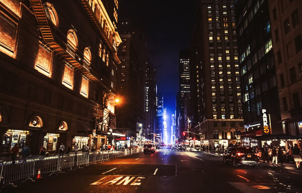 NEW YORK, USA - Sep 29, 2015: High-contrast image of streets of Manhattan at night. Manhattan is the most densely populated of the five boroughs of New York City