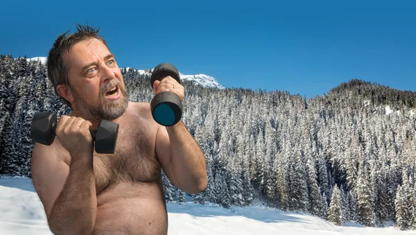 Hombre haciendo ejercicio con pesas — Foto de Stock