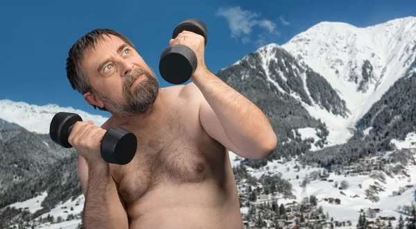 Hombre haciendo ejercicio con pesas — Foto de Stock