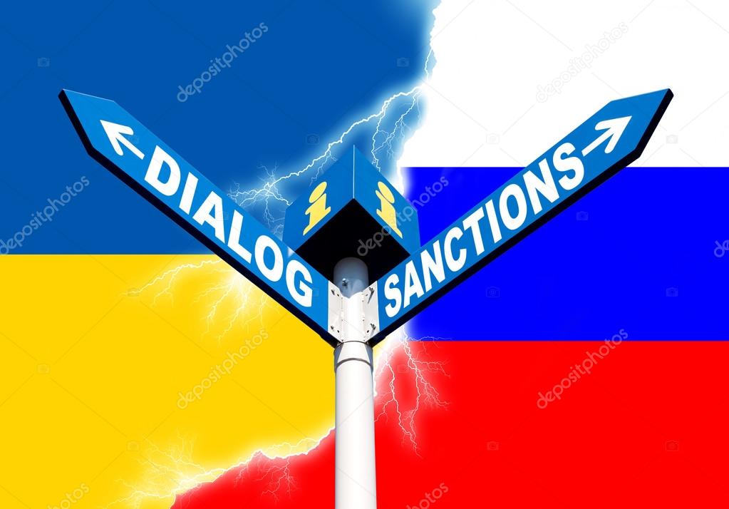 Political metaphor concept. Waymark with the words DIALOG and SANCTIONS against of the Ukrainian and Russian flags symbolizing the the conflict of civilizations