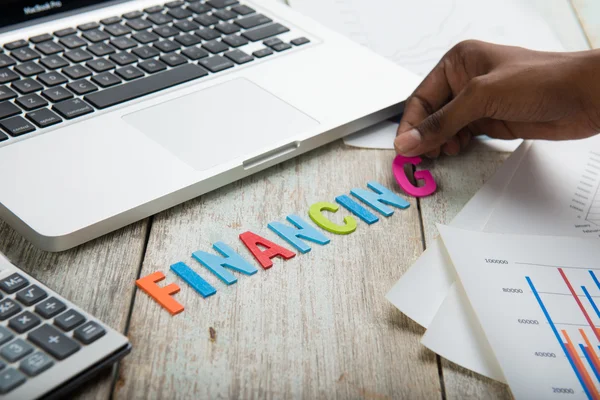 Wood letters as financingl word — Stock Photo, Image