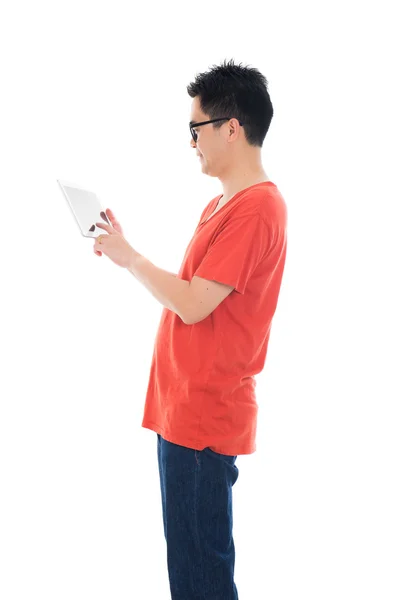 Casual asian male with tablet — Stock Photo, Image