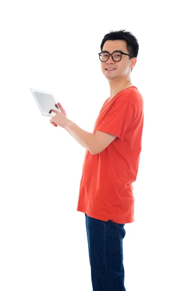 Casual asian male with tablet — Stock Photo, Image