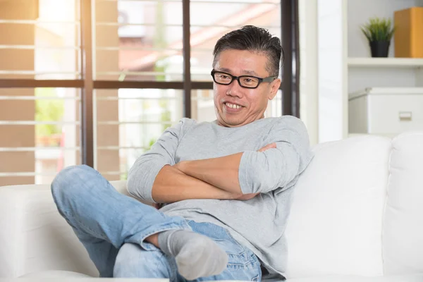 Matured asian male sitting — Stock Photo, Image