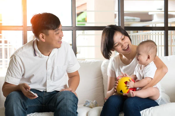 Asian parents playing with baby — Stock Photo, Image